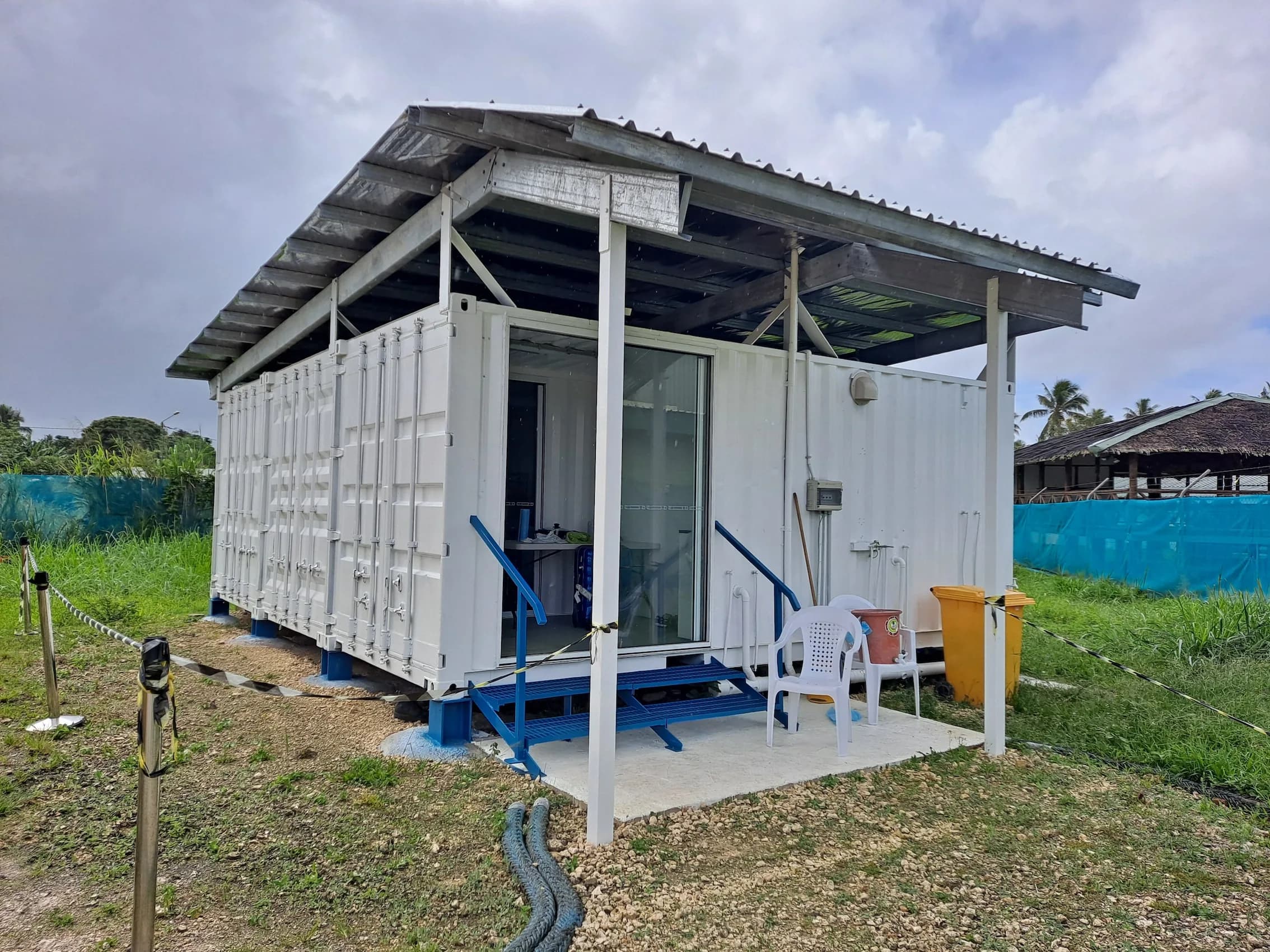 A converted shipping container with a veranda roof, crew accommodation on a deployment in Port Vila, Vanuatu.