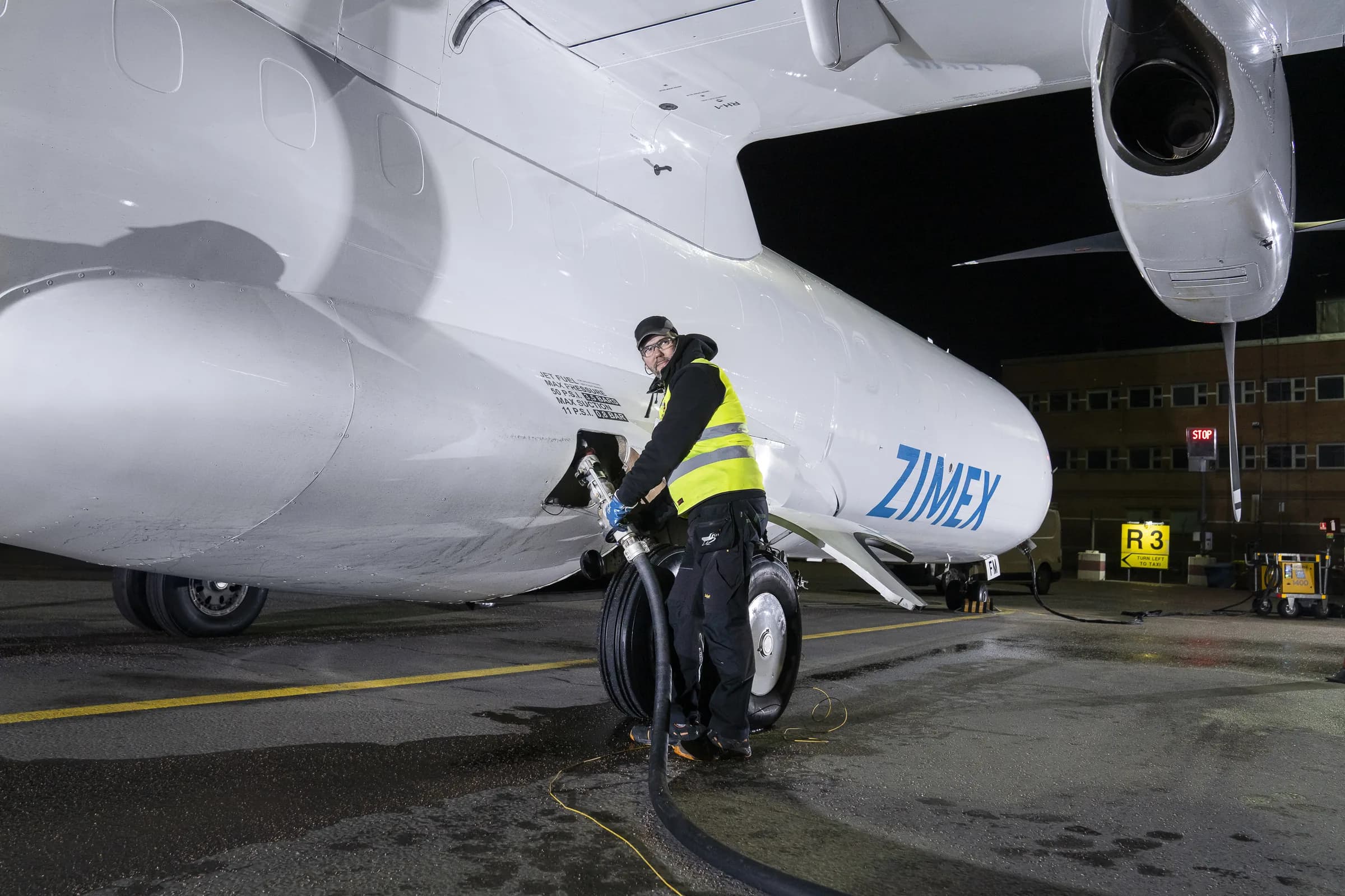 Refuelling an ATR 72 freighter before a night flight