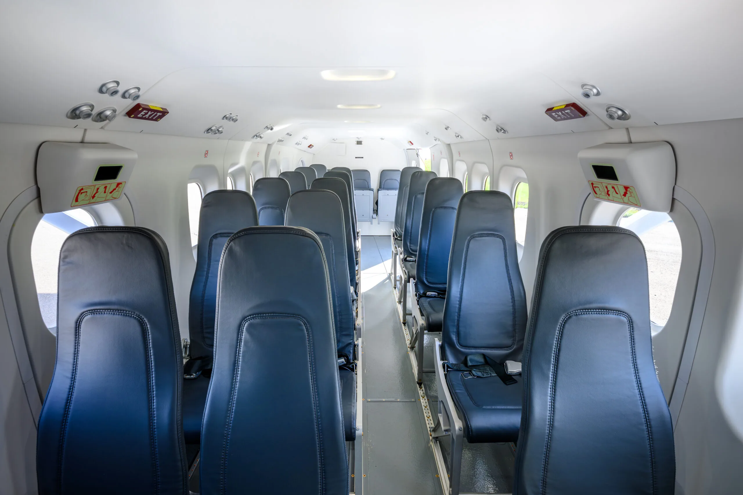 Cabin of the Twin Otter Classic 300-G, looking aft between the seats