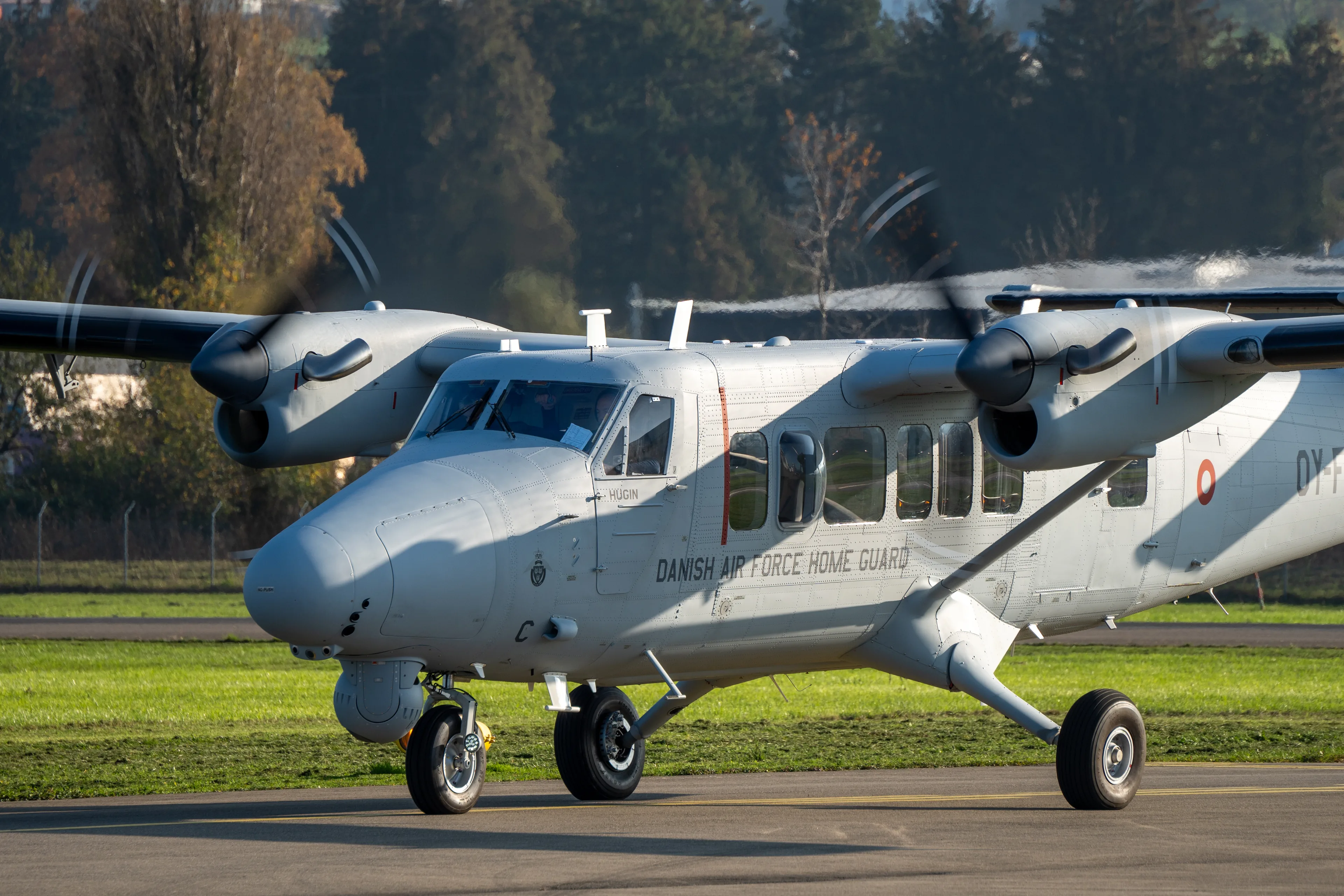 Grey Danish Home Guard Twin Otter with a surveillance sensor under the nose, taxiing at Altenrhein